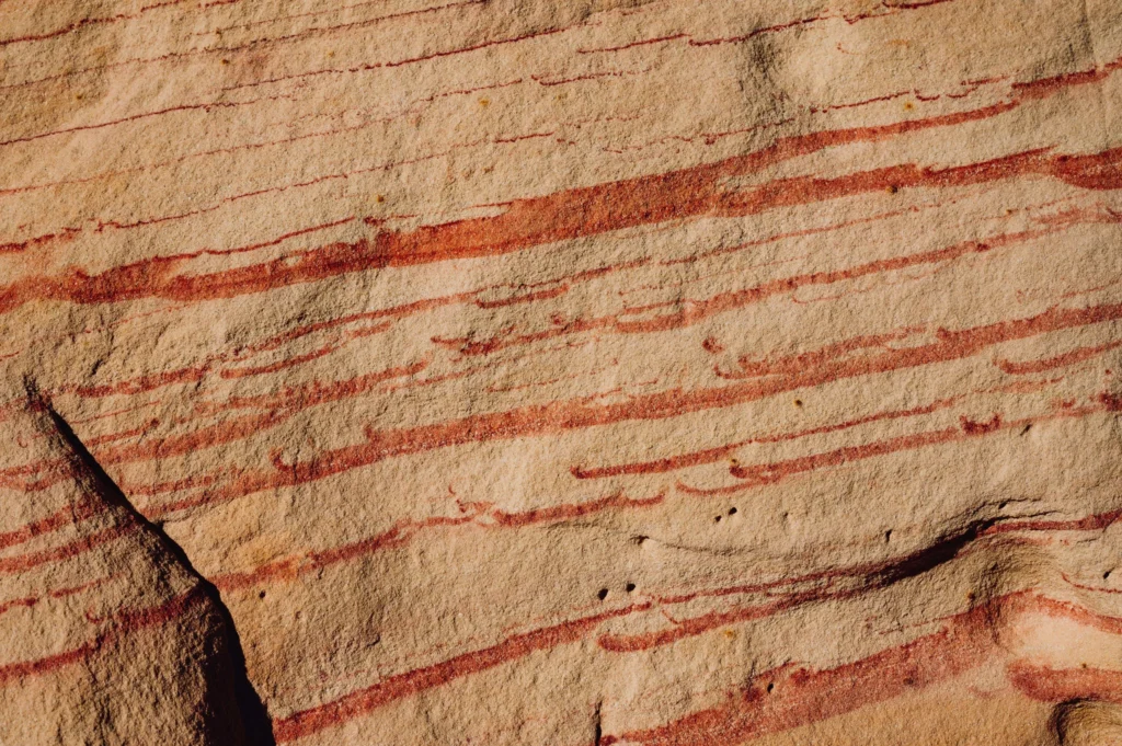 red lines on a rock